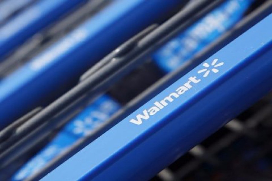 Shopping carts are seen outside a new Wal-Mart Express store in Chicago. 	— Reuters