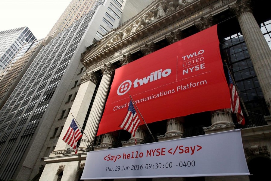 A banner for communications software provider Twilio Inc hangs on the facade of the New York Stock Exchange (NYSE) to celebrate the company's IPO in New York City, US, June 23, 2016. Reuters