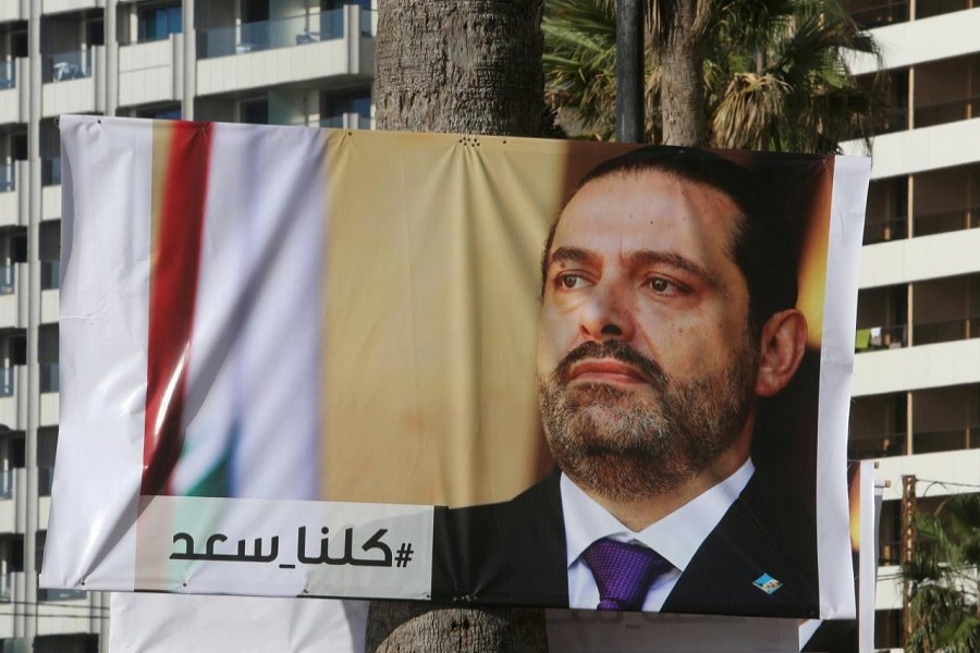 A poster depicting Lebanon's Prime Minister Saad al-Hariri, who has resigned from his post, is seen in Beirut, Lebanon, November 10, 2017. Reuters
