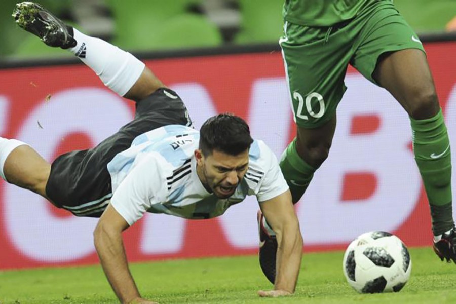 Sergio Aguero scored for Argentina before he was taken to hospital at hal-time. - AP photo