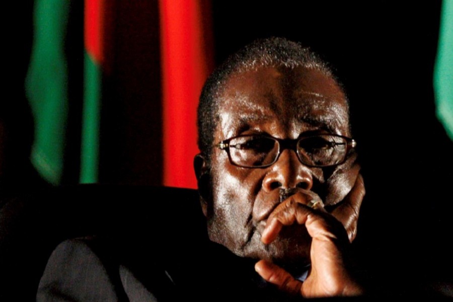 Zimbabwean President Robert Mugabe watches a video presentation during the summit of the Southern African Development Community in Johannesburg, South Africa August 17, 2008. Reuters/File Photo