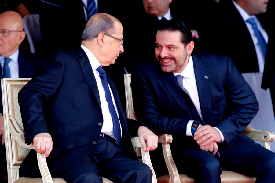 Saad al-Hariri talks with Lebanese President Michel Aoun at Beirut on Wednesday. -Reuters Photo