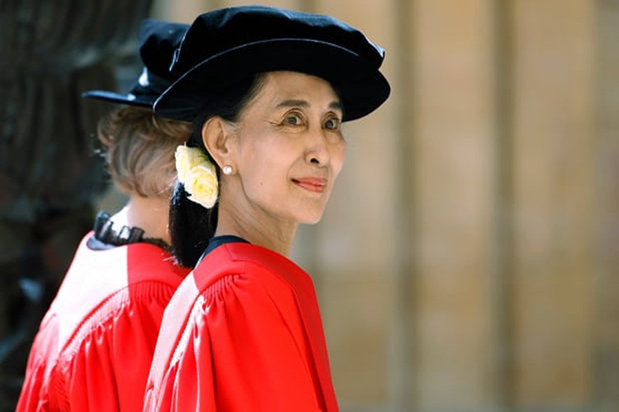 Aung San Suu Kyi in a procession to receive her honorary doctorate from the University of Oxford in 2012. Oxford city council has voted to strip her of her freedom of the city. Photo: AP