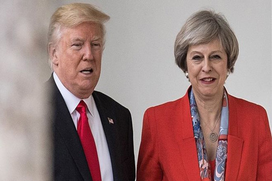 Donald Trump and Theresa May at the White House in January, photo collected