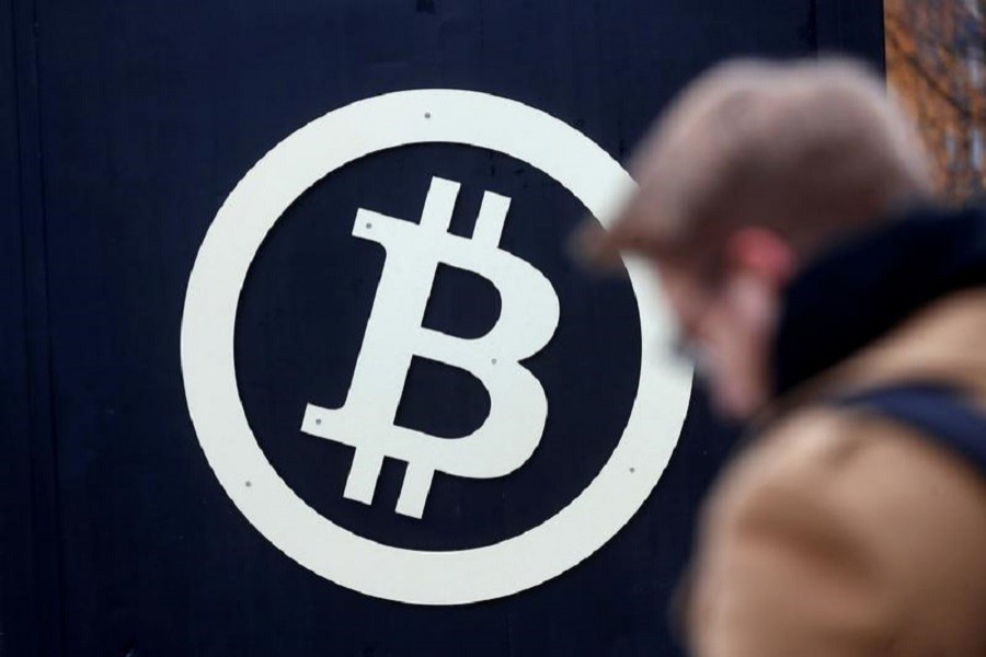 A bitcoin sign is seen during Riga Comm 2017, a business technology and innovation fair in Riga, Latvia November 9, 2017. Reuters/File Photo