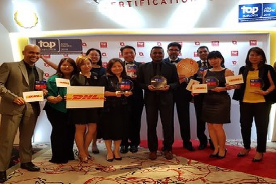 Representatives from DHL Express in the region receiving the  awards at the Top Employer Certification Dinner 2018.