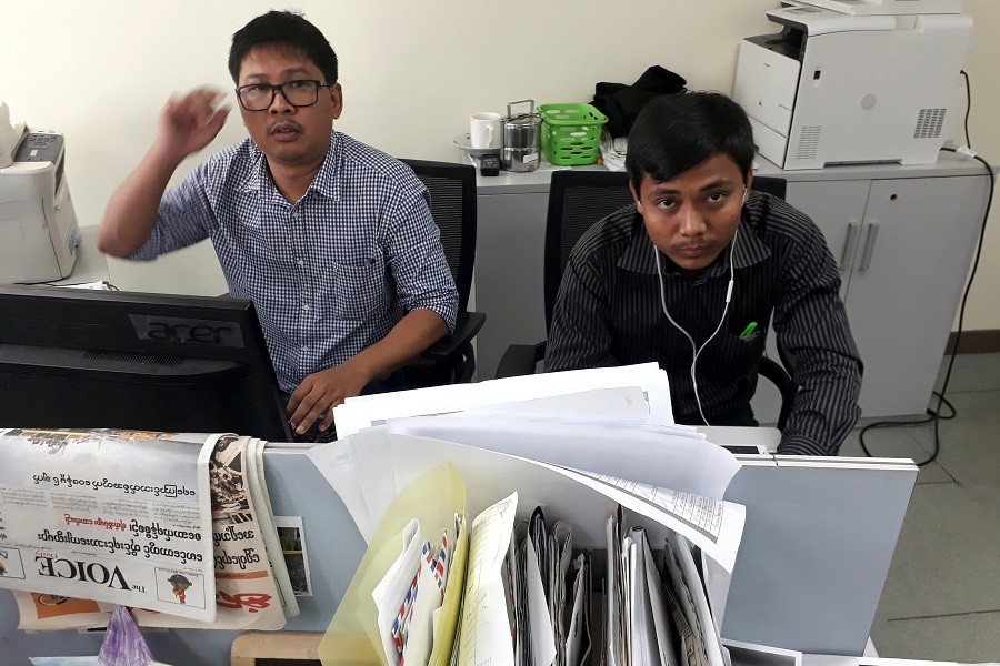 Reuters journalists Wa Lone (L) and Kyaw Soe Oo, who are based in Myanmar, pose for a picture at the Reuters office in Yangon, Myanmar December 11, 2017. Reuters/Files