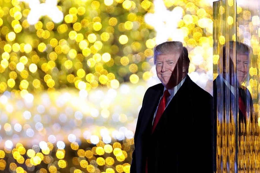 U.S. President Donald Trump attends the National Christmas Tree Lighting and Pageant of Peace ceremony on the Ellipse near the White House in Washington, US, November 30, 2017. - Collected