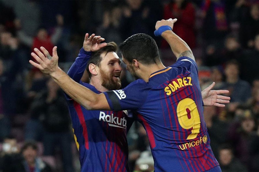 FC Barcelona vs Deportivo de La Coruna - Camp Nou, Barcelona, Spain - December 17, 2017. Barcelona’s Luis Suarez celebrates scoring their first goal with Lionel Messi. (Reuters Photo)