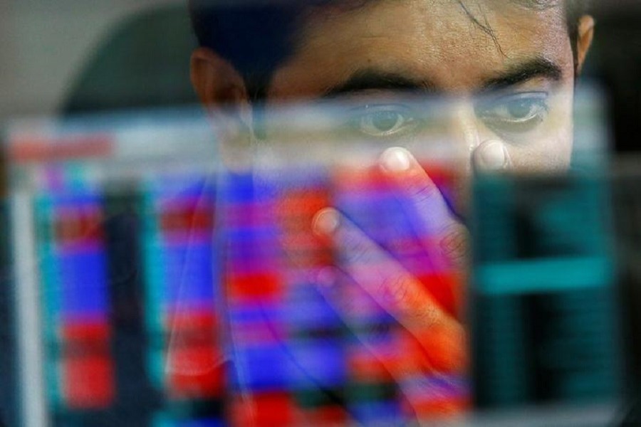 A broker reacts while trading at his computer terminal at a stock brokerage firm in Mumbai, India, November 9, 2016. Reuters/File Photo