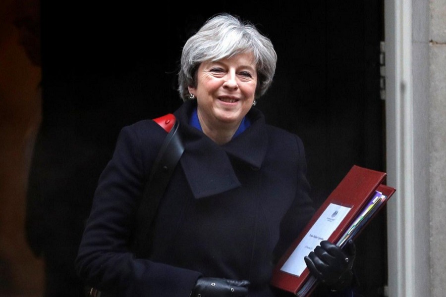 Britain's Prime Minister Theresa May leaves 10 Downing Street in London, Britain, December 20, 2017. Reuters