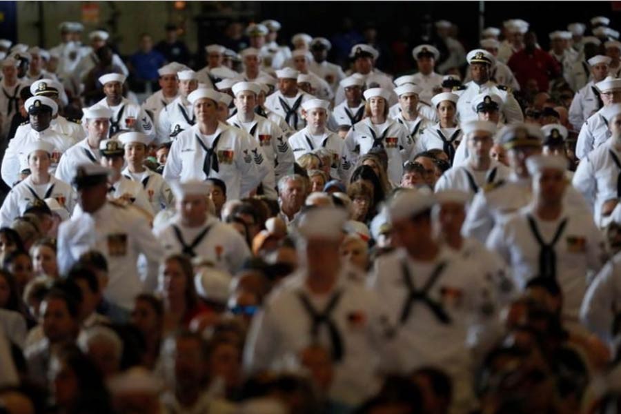 US Navy sailors stand in the audience as President Donald Trump participates in the commissioning ceremony of the aircraft carrier USS Gerald R. Ford at Naval Station Norfolk in Norfolk, Virginia, July 22, 2017. Reters.