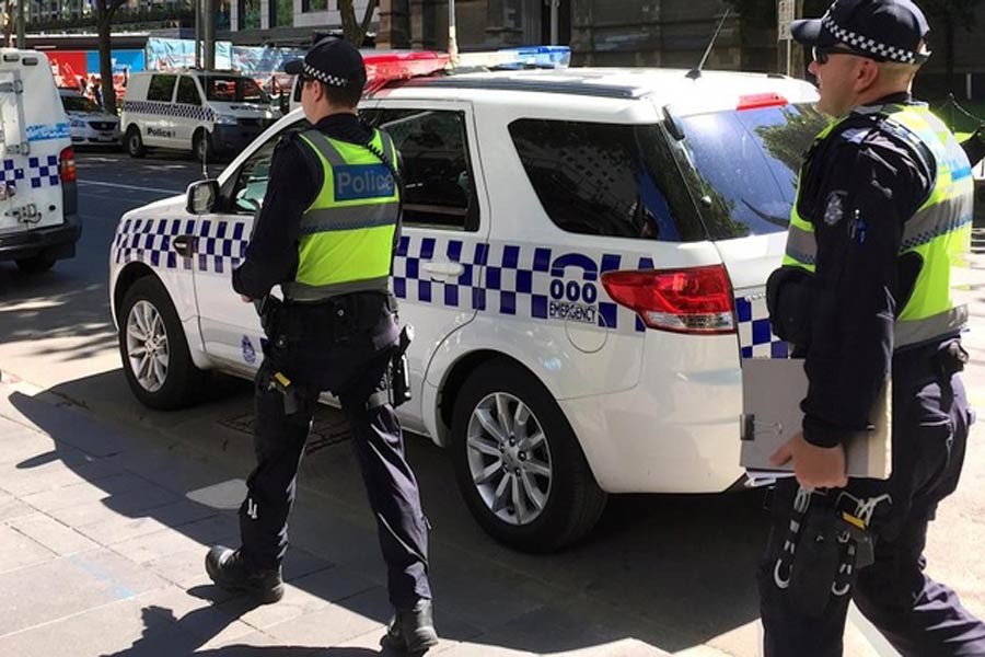 Australian police patrol the area where a driver on Thursday deliberately ploughed into pedestrians in central Melbourne, DEC 22,2017, Reuters.
