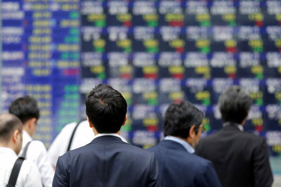 Asian shares mixed in light trading