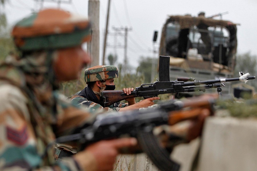Security personnel take position at an encounter site in Kashmir, India. - Reuters file photo