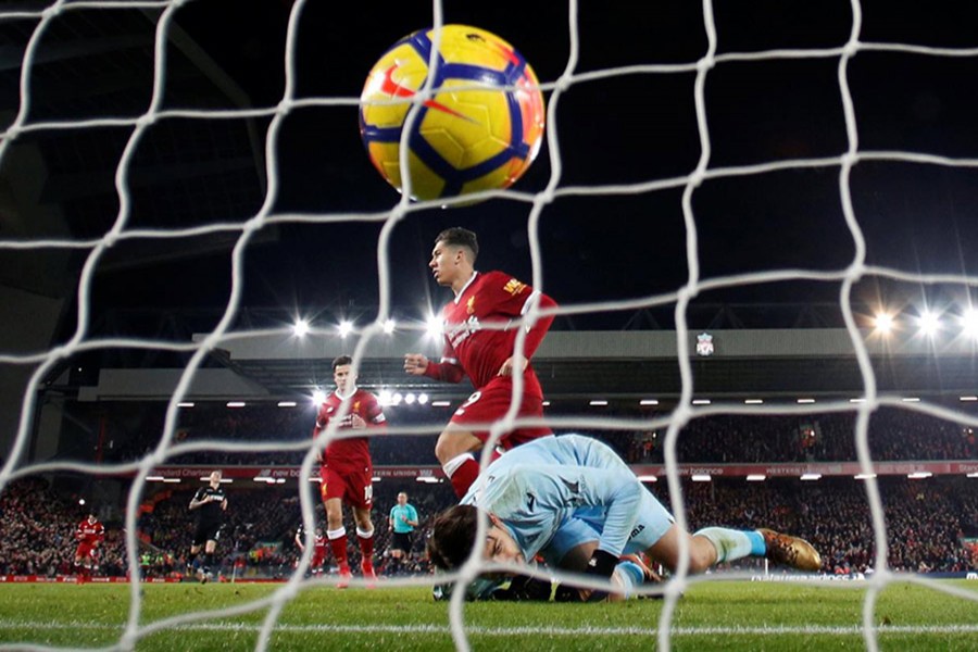 Liverpool's Roberto Firmino celebrates scoring their fourth goal in clash against Swansea City. - ReutersERS/Phil Noble