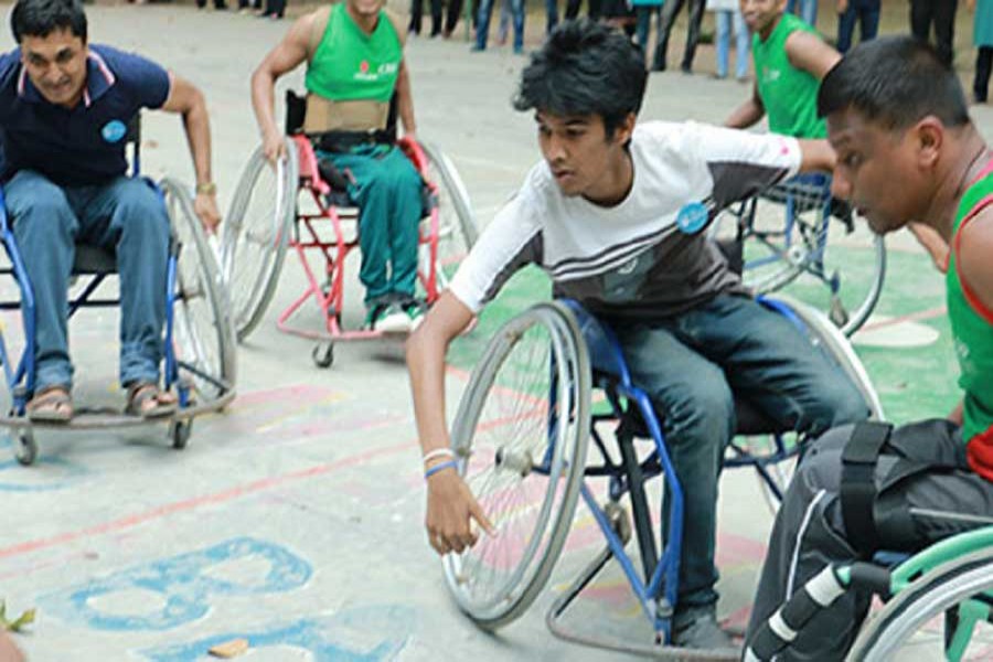 Physically-challenged youths are seen playing in this photo taken from the website of PDF, a local non-profit.