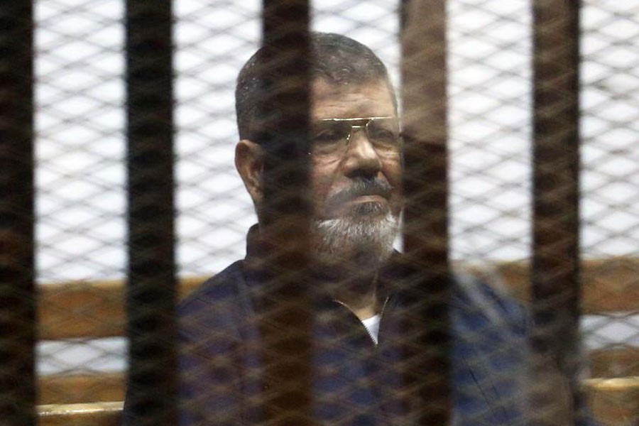 Egypt jails Morsi, 19 others for insulting judiciary