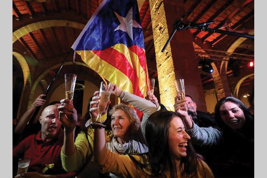 People in Barcelona celebrate after Catalonia's separatists regained power in regional elections, December 21, 2017.   	— Photo: Reuters