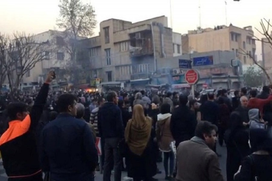 People protest near the University of Tehran, Iran December 30, 2017 in this picture obtained from social media. Reuters