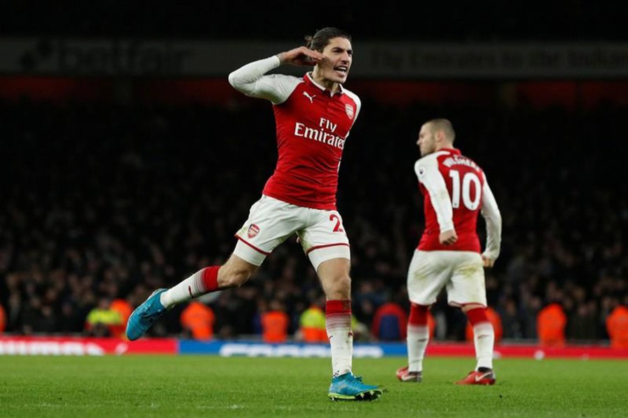 0Arsenal's Hector Bellerin celebrates scoring their second goal in classic against Chelsea. - Reuters photo