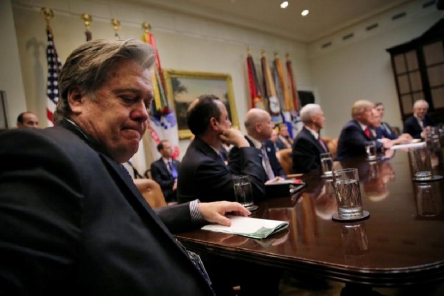 White House Chief Strategist Stephen Bannon (L) is seen attending a meeting at the Roosevelt room of the White House in Washington US, February 2, 2017. Reuters/File Photo