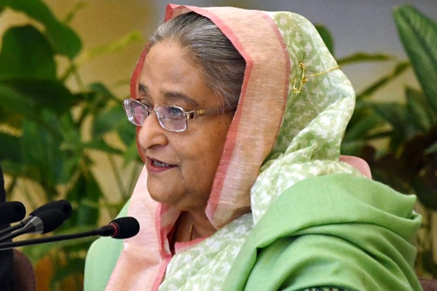 Prime Minister Sheikh Hasina addresses the inaugural programme of a three-day 'National Development Fair 2018' at Ganabhaban on Thursday. -Focus Bangla Photo