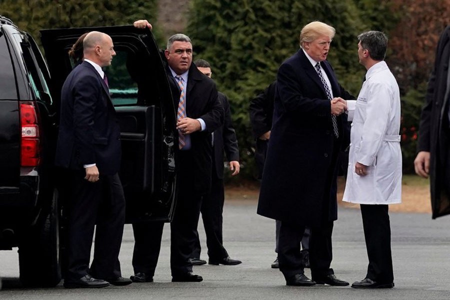 President Trump shaking hands with Dr. Ronny L. Jackson after having a physical exam on Friday: Reuters