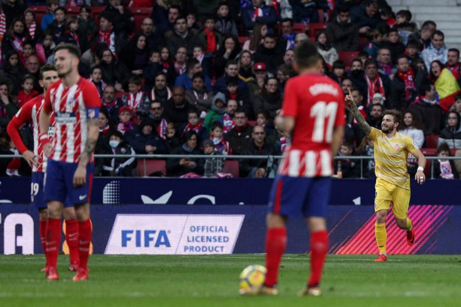 Girona's Portu celebrates scoring their first goal during Saturday's clash against Atletico Madrid. - Reuters photo