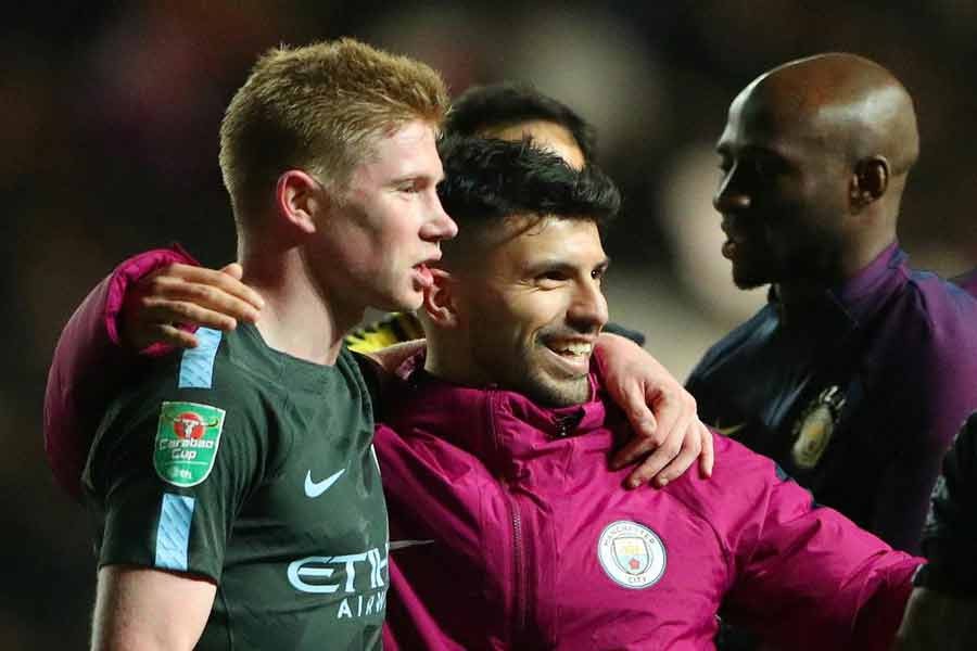 Manchester City's Kevin De Bruyne and Sergio Aguero celebrate after the match. Photo: Reuters