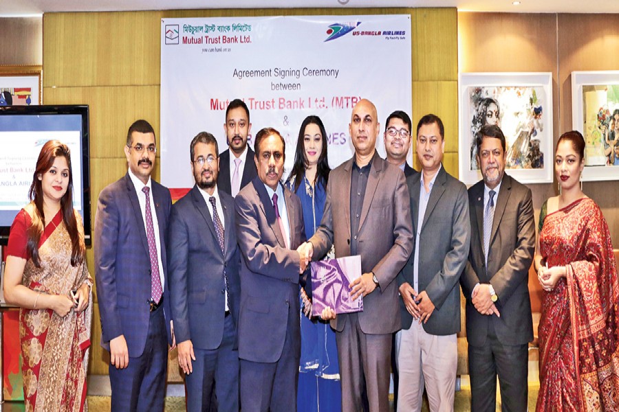 Mutual Trust Bank Limited (MTB) and US-Bangla Airlines (USBA) signed an agreement on discount facility recently. Sohail Majid, Deputy Director, Marketing & Sales of USBA, and Syed Rafiqul Haq, Deputy Managing Director and Chief Business Officer (CBO) of MTB, signed the agreement.