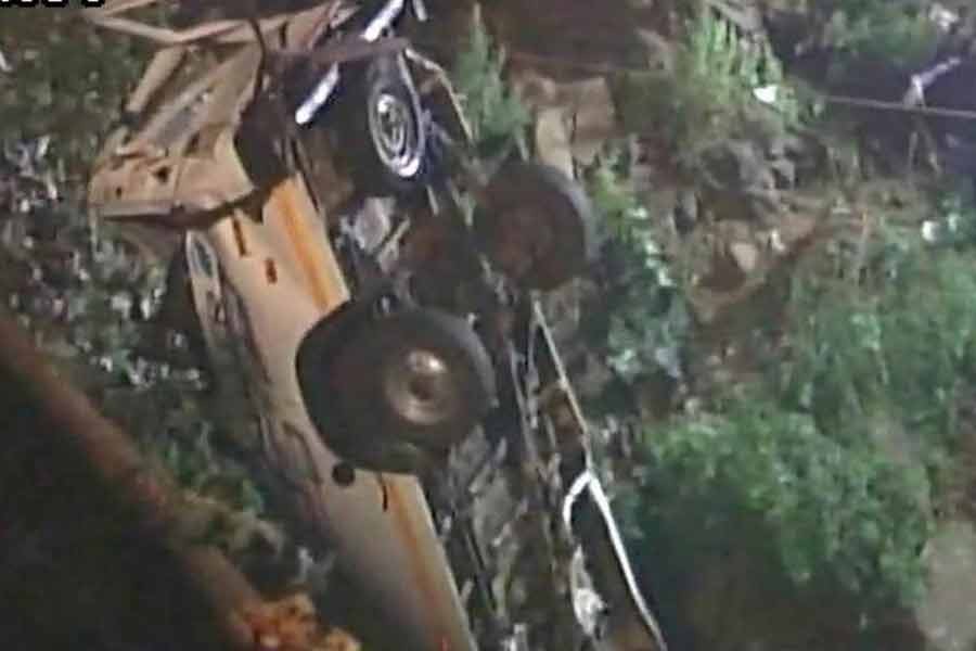 The mini bus that plunged into Panchganga River along the Shivaji Bridge in Maharashtra’s Kolhapur. Photo: Hindustan Times