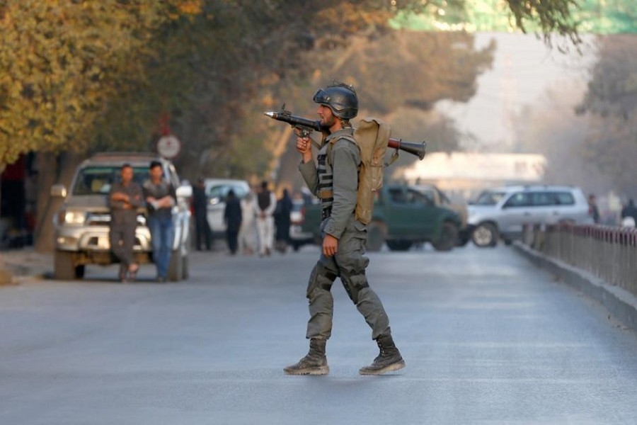 An Afghan policeman keeps watch near the site of a blast in Kabul, Afghanistan.October 31, 2017. Reuters/File Photo