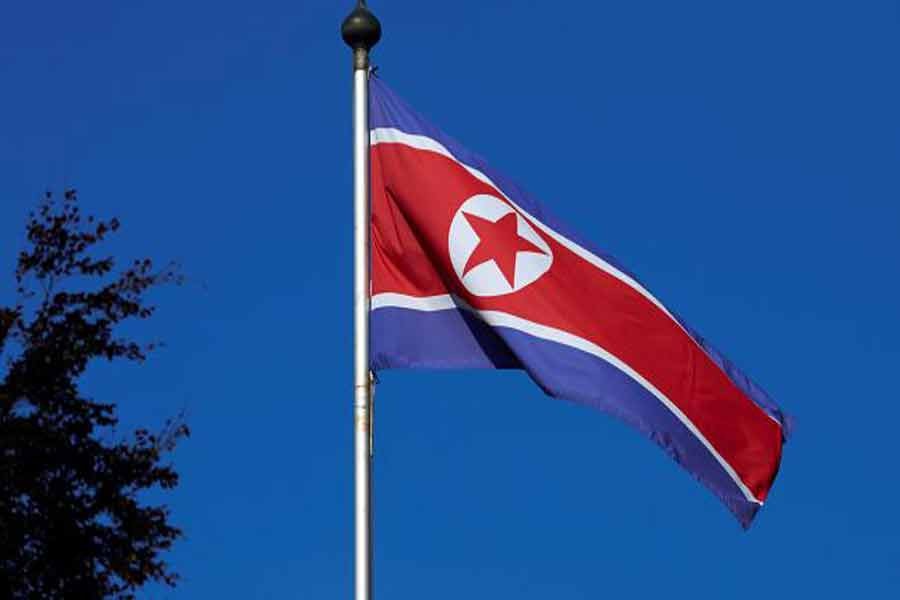 A North Korean flag flies on a mast at the Permanent Mission of North Korea in Geneva October 2, 2014. Reuters’s file photo