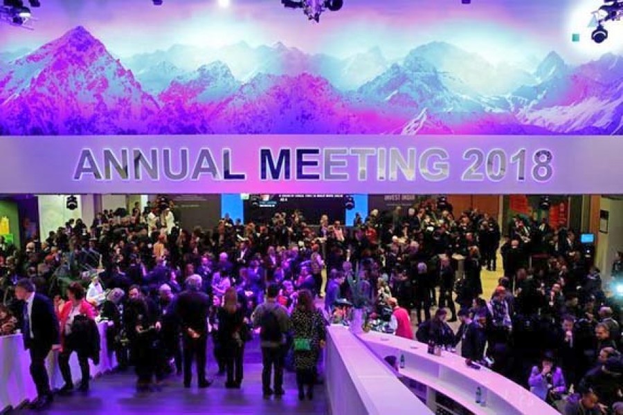 Delegates to the World Economic Forum annual meeting attend a reception in Davos, Switzerland, January 22, 2018. 	— Photo: Reuters