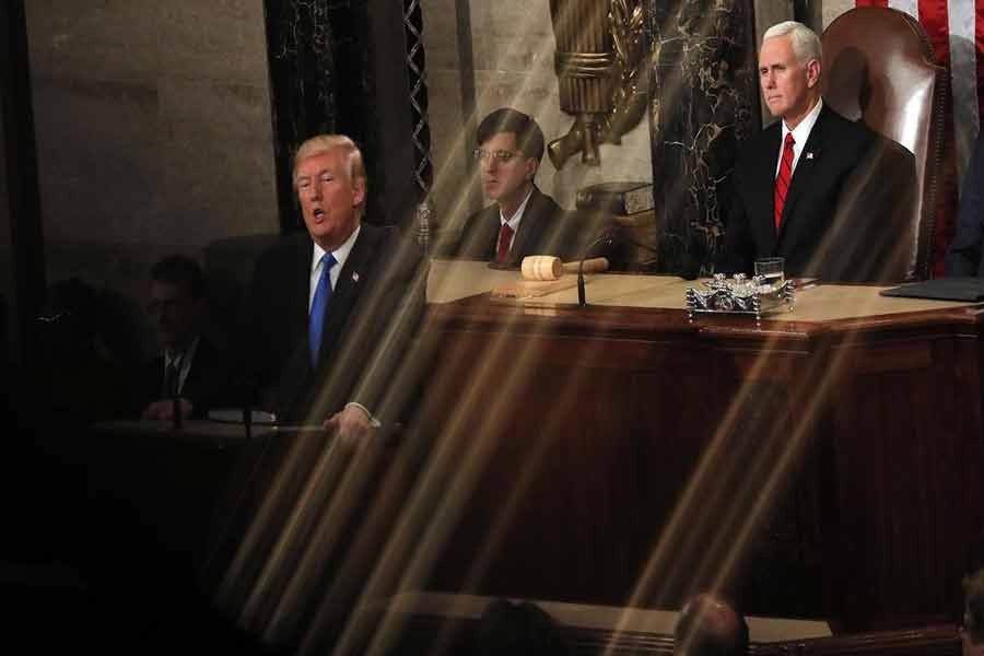 Vice President Mike Pence watches as US President Donald Trump delivers his State of the Union address to a joint session of the US Congress on Capitol Hill in Washington, US January 30, 2018. Photo: Reuters