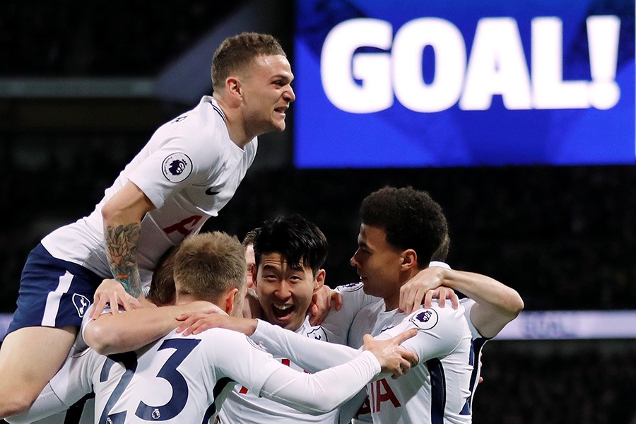 Tottenham's Christian Eriksen celebrates with team mates after scoring their first goal against United. - Reuters file photo