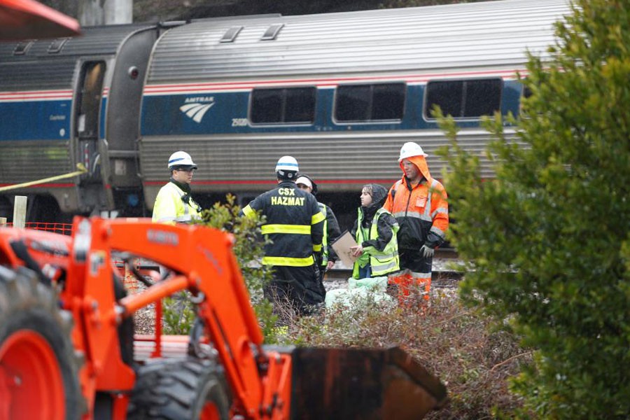 Emergency responders are at the scene after an Amtrak passenger train collided with a freight train and derailed in Cayce, South Carolina, US, February 4, 2018. (REUTERS)