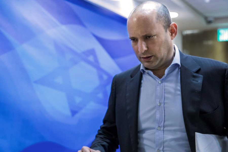 Israeli Education Minister Naftali Bennett enters the weekly cabinet meeting at the Prime Minister's office in Jerusalem. February 4, 2018. (REUTERS)