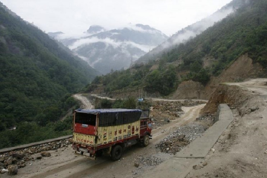 A liquefied petroleum gas (LPG) delivery truck drives along Tezpur-Tawang highway which runs to the Chinese border, in the northeastern Indian state of Arunachal Pradesh May 29, 2012. Reuters/File Photo