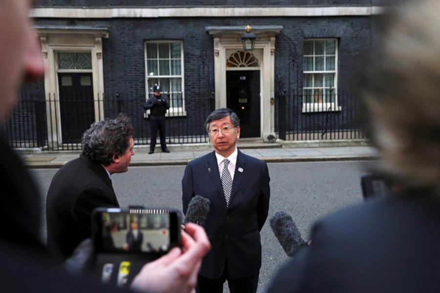 Koji Tsuruoaka speaks outside 10 Downing Street after a meeting between Britain's Prime Minister Theresa May and senior members of Japanese companies, in London, February 8, 2018. (Reuters).