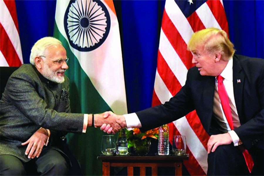 INDIAN PRIME MINISTER NARENDRA MODI (LEFT) MET WITH US PRESIDENT DONALD TRUMP IN MANILA, PHILIPPINES ON NOVEMBER 13, 2017 ON THE SIDELINES OF ASEAN SUMMIT: "Trump's effusive remarks about Modi and India and very pointed renaming of Asia-Pacific region as the Indo-Pacific region are the soft sell to woo India into joining in a US-led strategic coalition to confront a rising China."