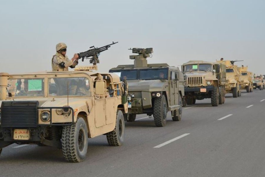 Egyptian Army's Armoured Vehicles are seen on a highway to North Sinai during a launch of a major assault against militants, in Ismailia, Egypt. (Reuters)