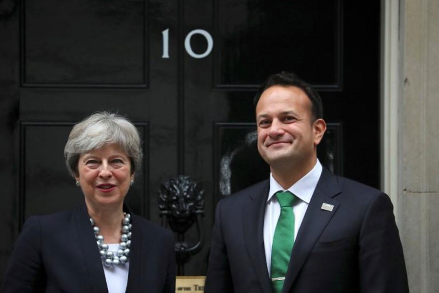 Britain's Prime Minister Theresa May welcomes Ireland's Taoiseach Leo Varadkar to Downing Street in London, September 25, 2017. (REUTERS)