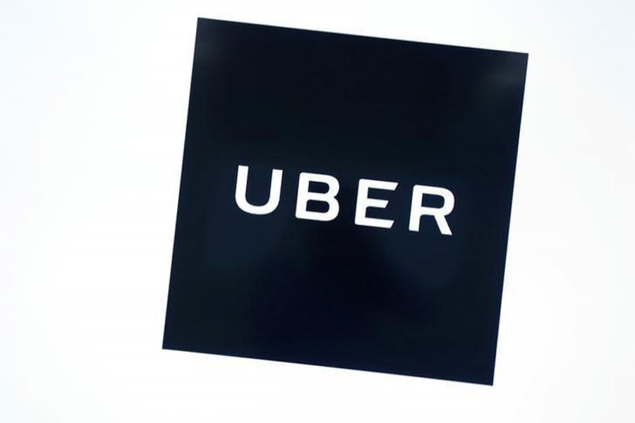 Uber's logo is pictured at its office in Tokyo, Japan, November 27, 2017. Reuters/File Photo