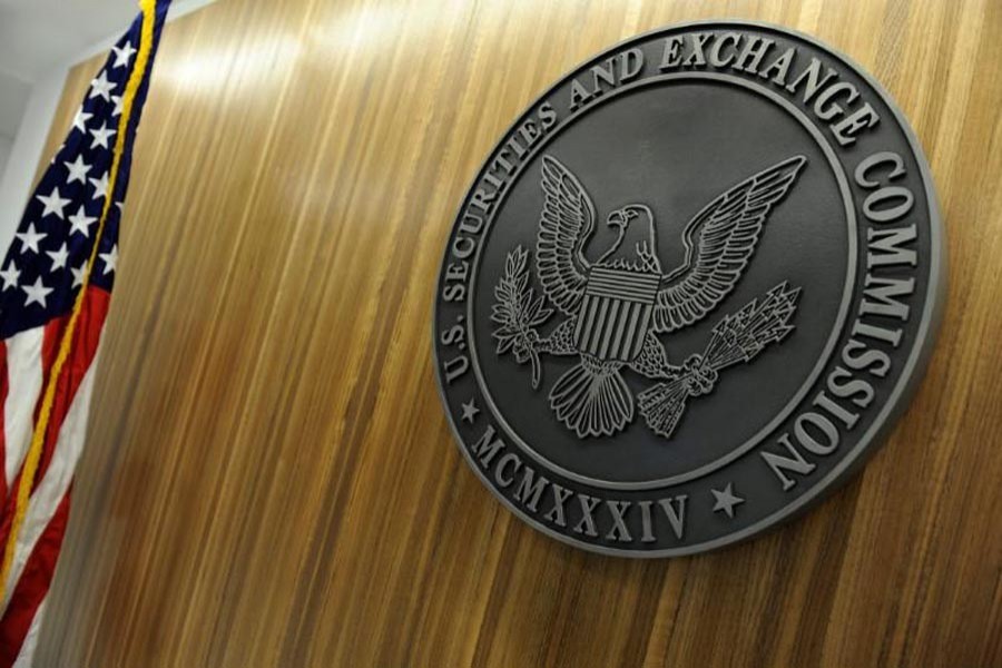 The seal of the US Securities and Exchange Commission hangs on the wall at SEC headquarters in Washington, US, June 24, 2011. Reuters/File Photo