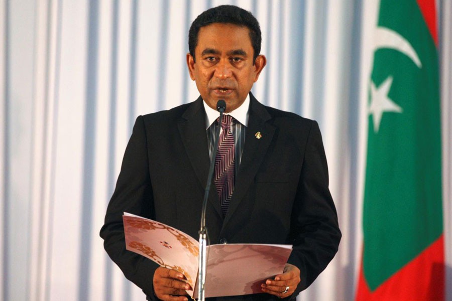 Abdulla Yameen takes his oath as the President of Maldives during a swearing-in ceremony at the parliament in Male November 17, 2013. (Reuters)