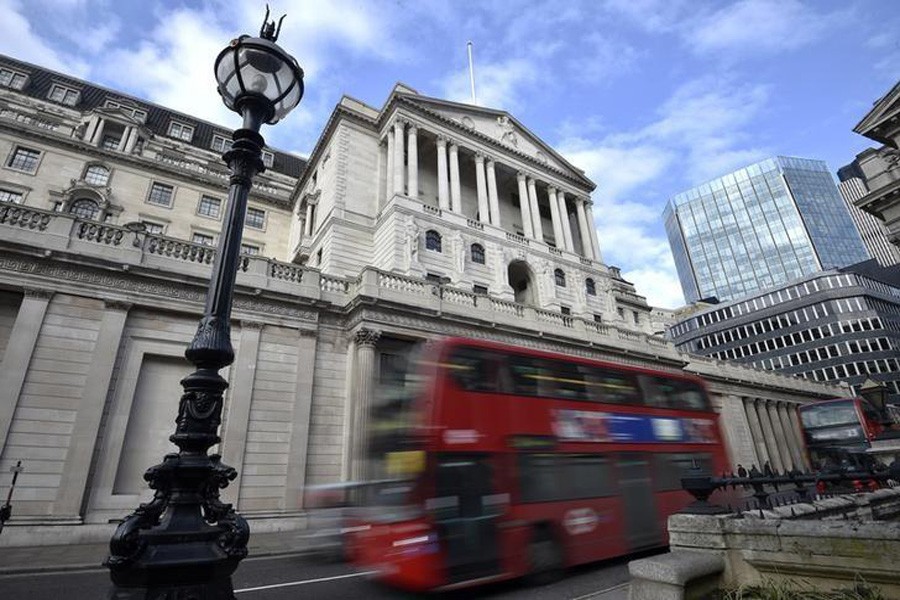 A bus passes the Bank of England in the City of London, Britain, February 14, 2017. Reuters/File Photo