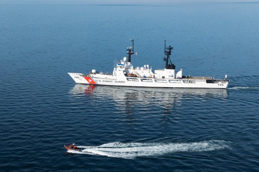 The Coast Guard Cutter Midgett, a 378-foot high-endurance cutter homeported in Seattle, transits the Strait of Juan de Fuca enroute to Seattle, Washington, US in this October 13, 2015. Petty Officer 1st Class Levi Read/US Coast Guard/Handout via Reuters