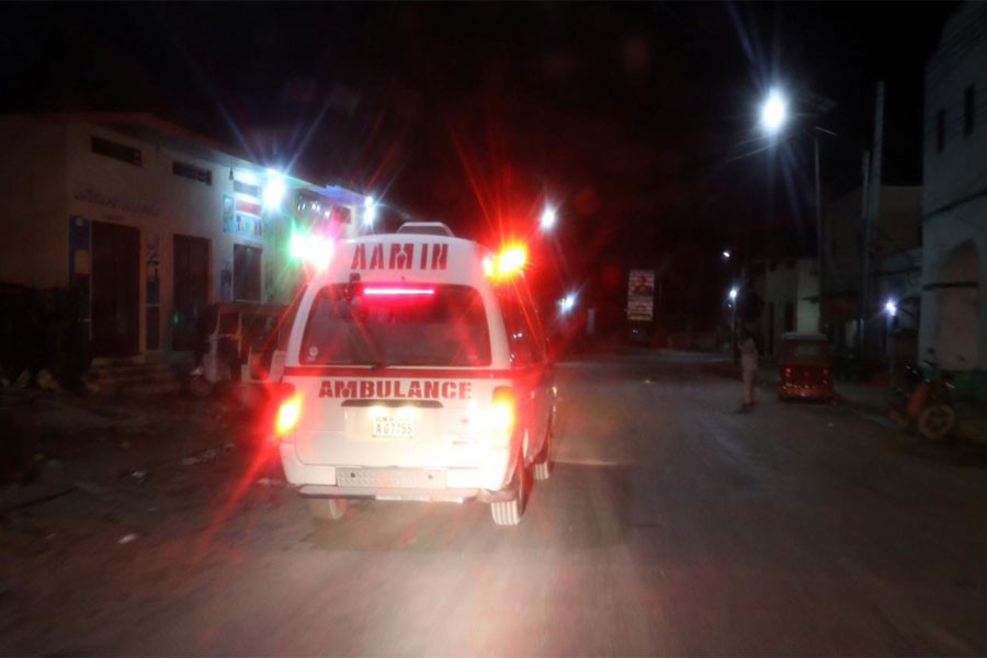 Aamin ambulance drives from the scene of an explosion near the Presidential palace in Mogadishu, Somalia February 23, 2018. (REUTERS)